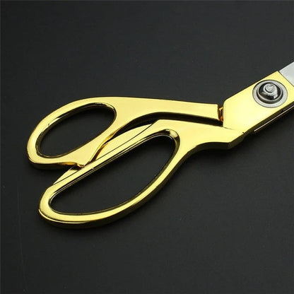 Stainless steel scissors for professional cloth cutting.