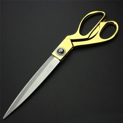 Premium cloth cutting scissors with gold finish.