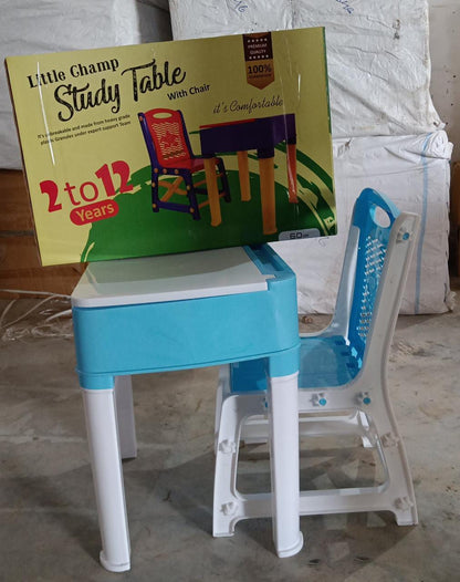 Children's study table and chair set in blue, features a pencil box and sturdy plastic build.